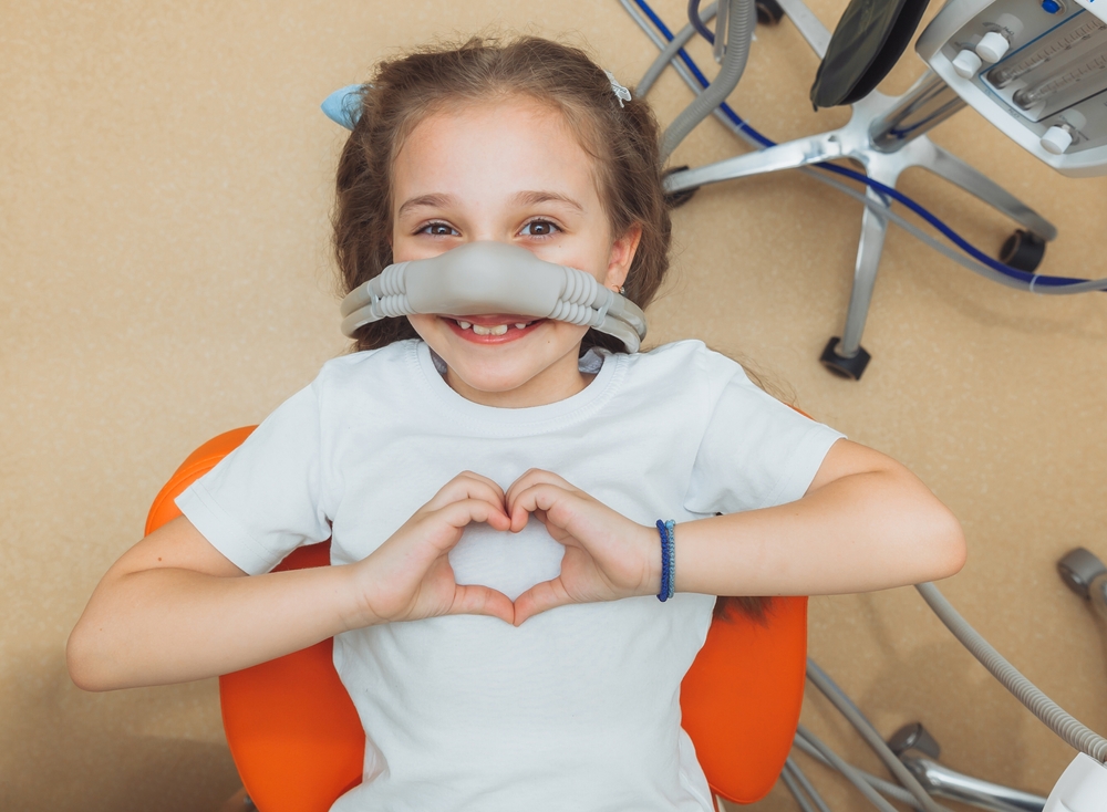 Dental patient receiving comfortable sedation dentistry treatment – dentist williamsville ny